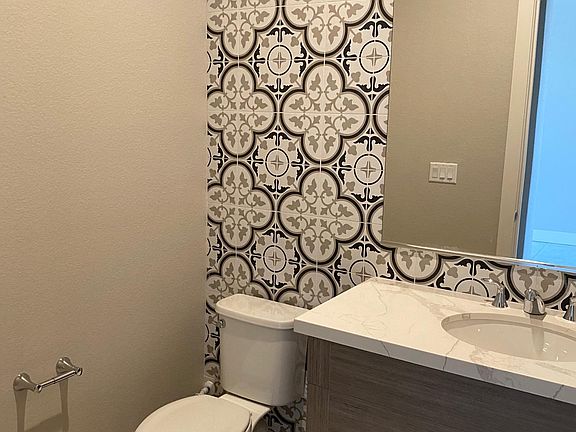 Half bathroom is located on the first floor.