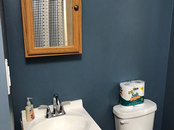 full bathroom with tub 