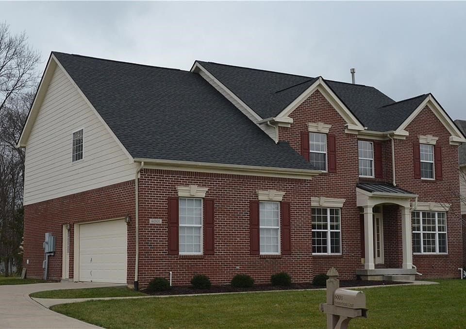 Timeless Brick Exterior and multiple roof peaks gives this home lots of curb appeal.
