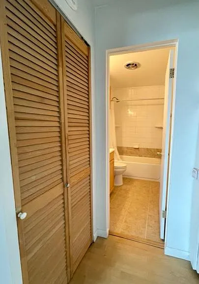 Hallway and closet with convenient bathroom access