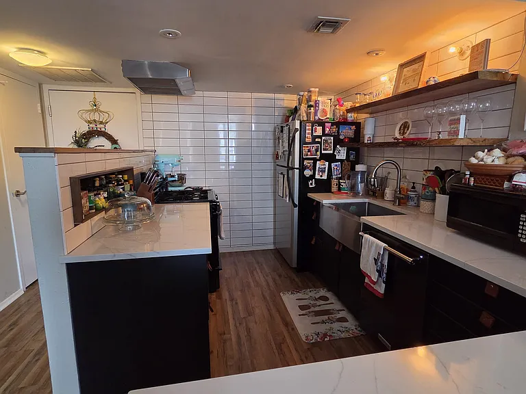 Dining bar opens onto kitchen
