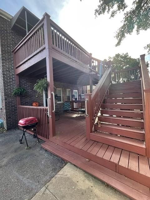 The back side of the building where you can go to your back door and enter your new apartment.