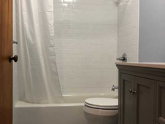 Totally new bathroom. Tile floor and tile shower/bath.