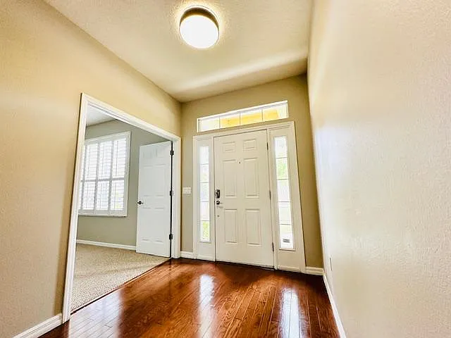 Entry w/ Cherry Wood Floors