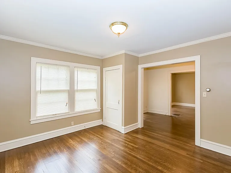 The dining room has a closet for dishes or other items. The Hardwood Floors have been refinished throughout the house.