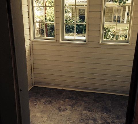 Newly redone enclosed back porch