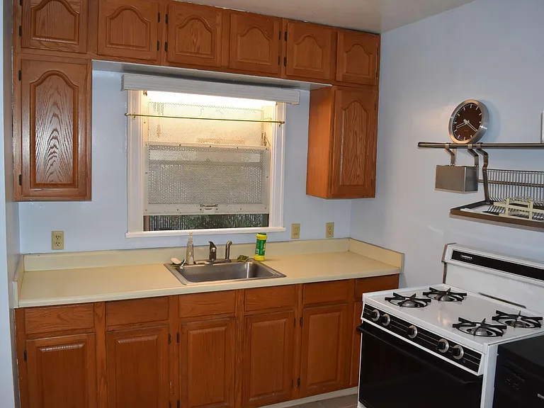Kitchen (sink, window, and stove)