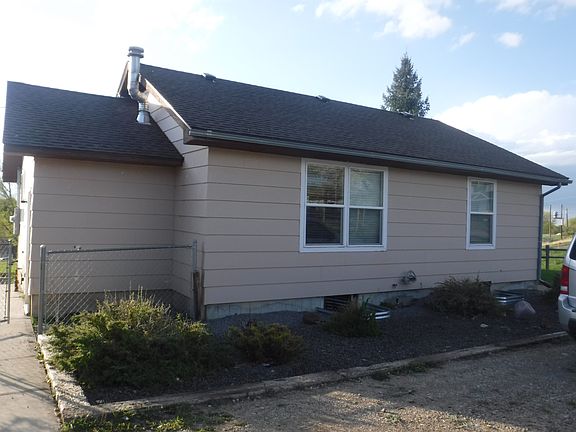 Side by the driveway