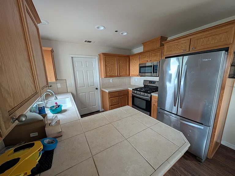 Kitchen - comes with stove, fridge, and dishwasher - renters are responsible to repairs of applicances