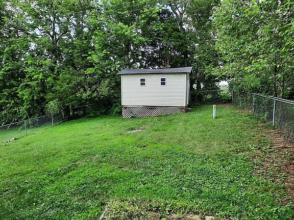 Spacious Back Yard with Shed
