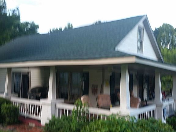 Left side-wrap around porch