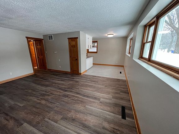 The view from the living room toward dining room. A handy coat closet is right there.