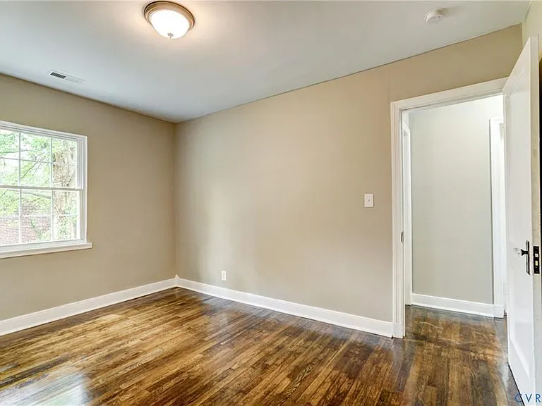 Middle bedroom looking into the hallway.