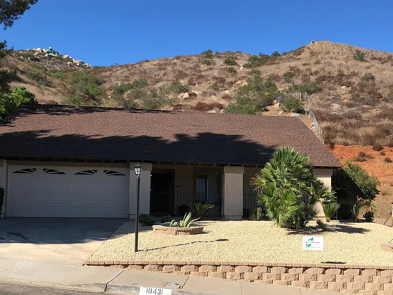 Newly landscaped low maintenance front yard with auto drip irrigation