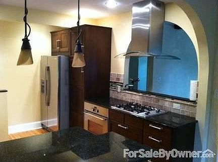 Kitchen with opening to Living Room