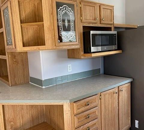 Kitchen with microwave