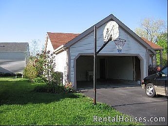 2 car attached garage w/new door & opener