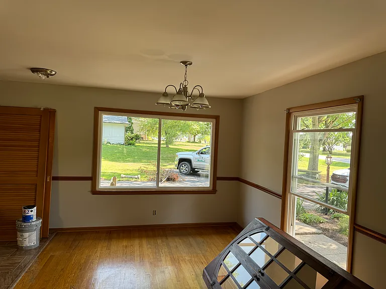 Dining Room. The cabinet shown in the picture is being removed.