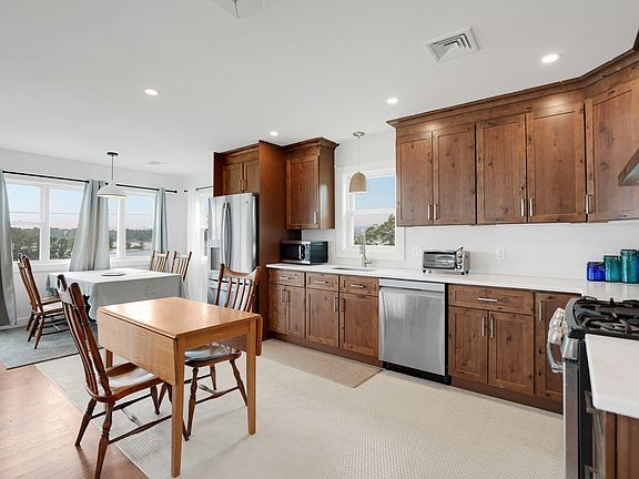 Open Floor Plan kitchen on second level with a waterfront view