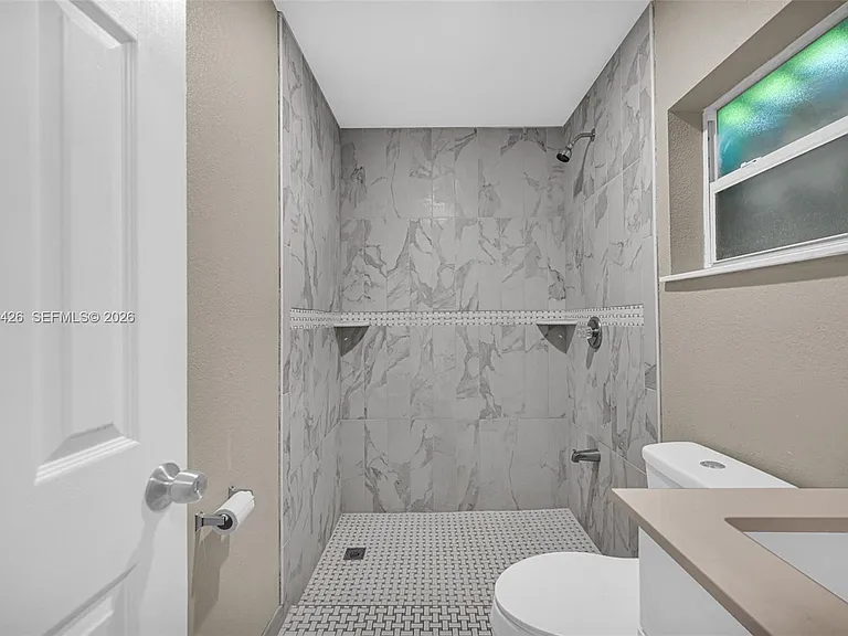 81 NW 41st St — Photo 15