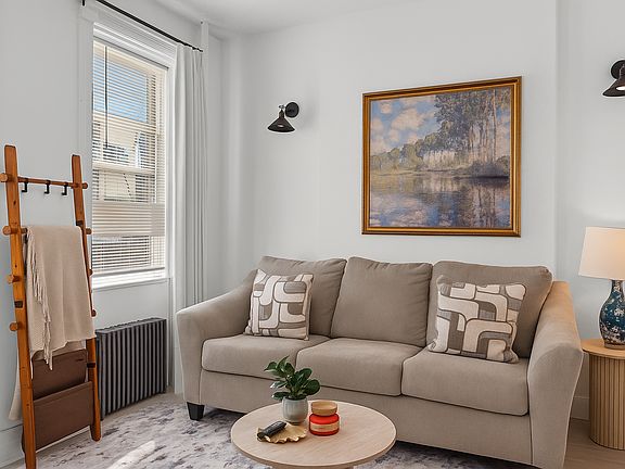 Cozy living room with a sofa bed that opens to a Queen Bed