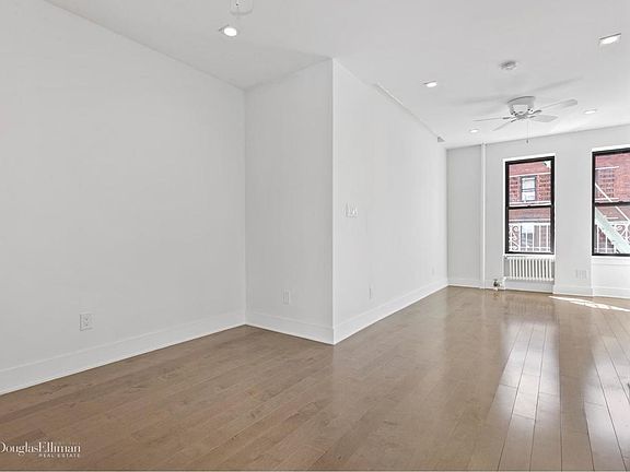 5th image of 321 E 12th St APT 21