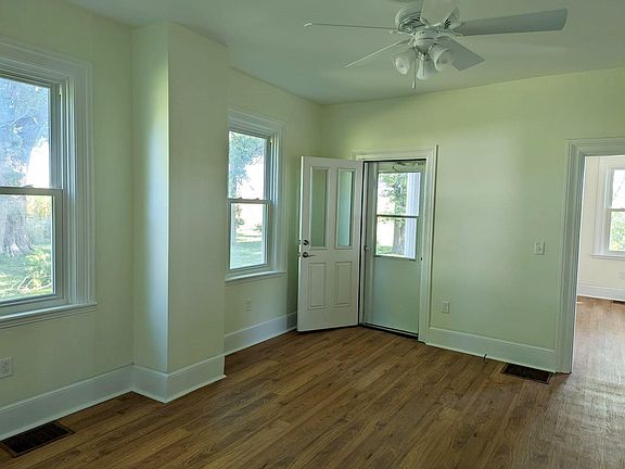 Living room with door to back porch