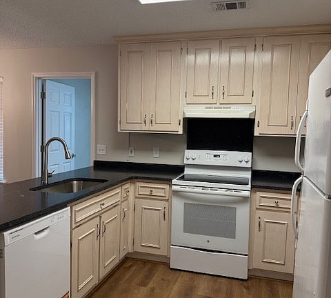 Kitchen with new Granite countertop and new dishwasher
