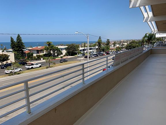 The deck runs the entire front of the apartment and has gorgeous sweeping ocean view from Palos Verdes to Malibu
