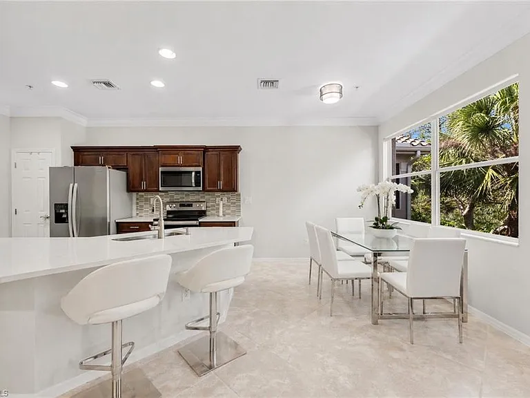 12850 Carrington Cir #203 — Photo 9