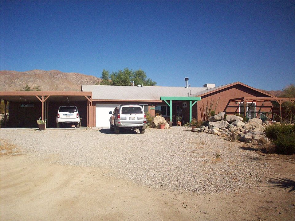 Front with Carport & Garage