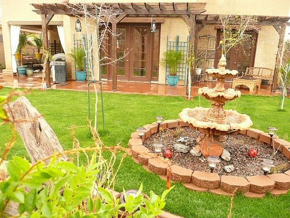 Backyard w/Pergolas, Patios, 3 Tier Water Fountain & Stained Concrete