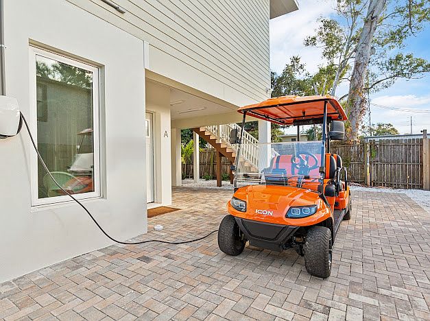 One parking w/electric charger for car or gulf cart