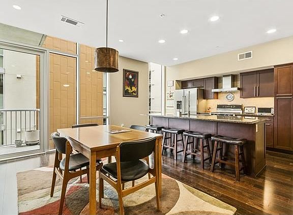 Spacious dining area open to kitchen.