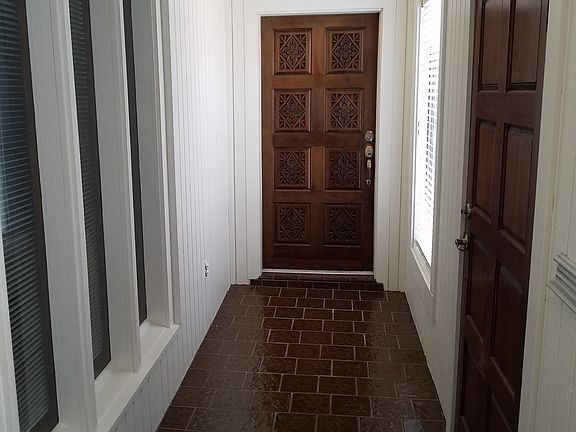 Covered walkway to garage
