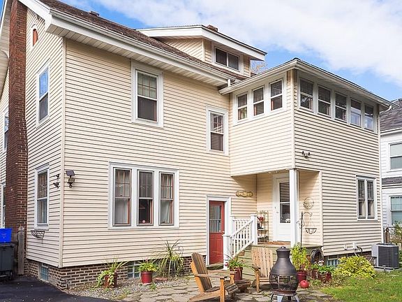 South East elevation of home with patio and back entrance.