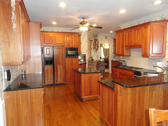 cherry cabinets and granite counters