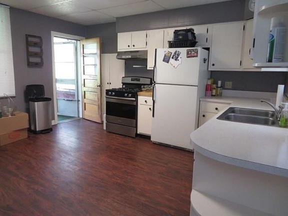Newly painted kitchen with new flooring!