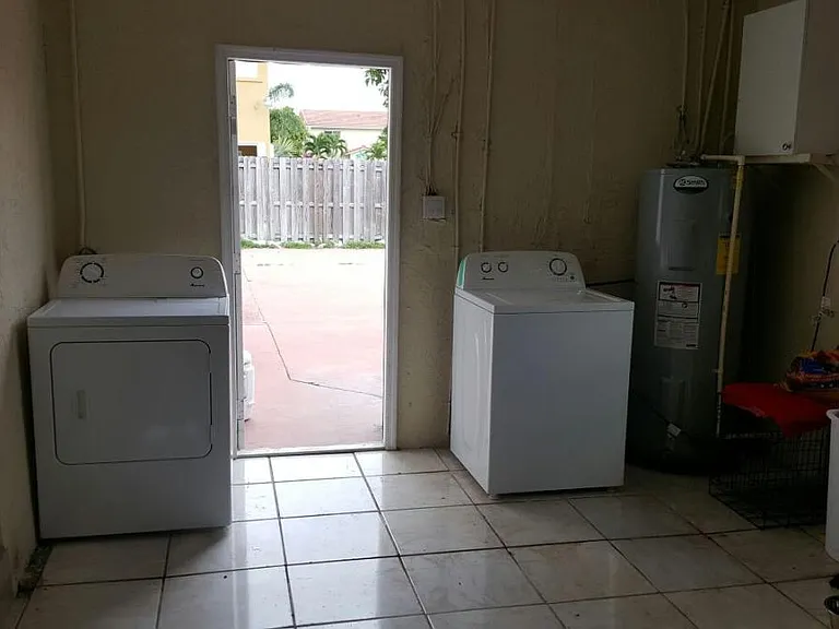 Laundry Area inside 2 car Garage