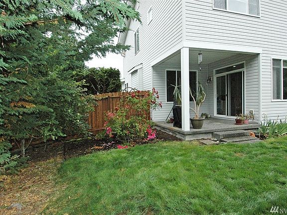 Covered back porch ! S0 nice!