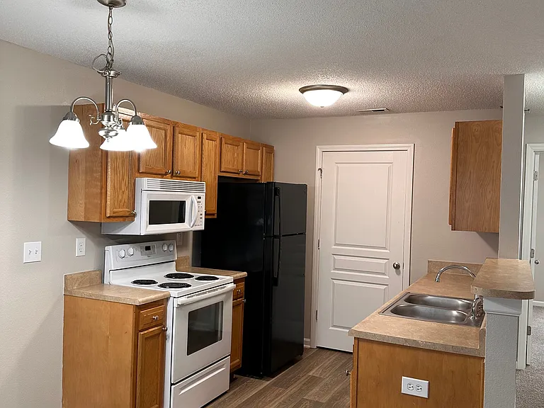 Upstairs 1 - Bedroom - Kitchen