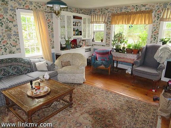 Full Living Room Beautiful original Hardwood Floors.