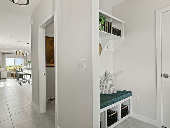 Atlantic Plan Single Story Home by DRB Homes, Entry and Drop Zone Staged. Atlantic Plan available in