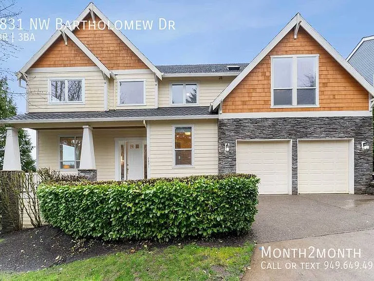 9831 NW Bartholomew Dr — Photo 35