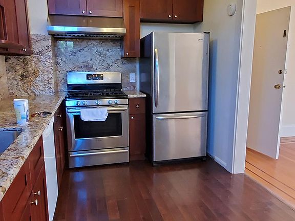 Kitchen with very tall cabinets