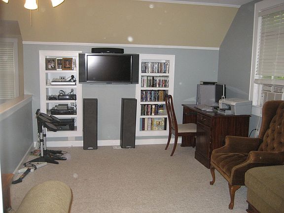 Bonus Room Upstairs with Built-In Shelving