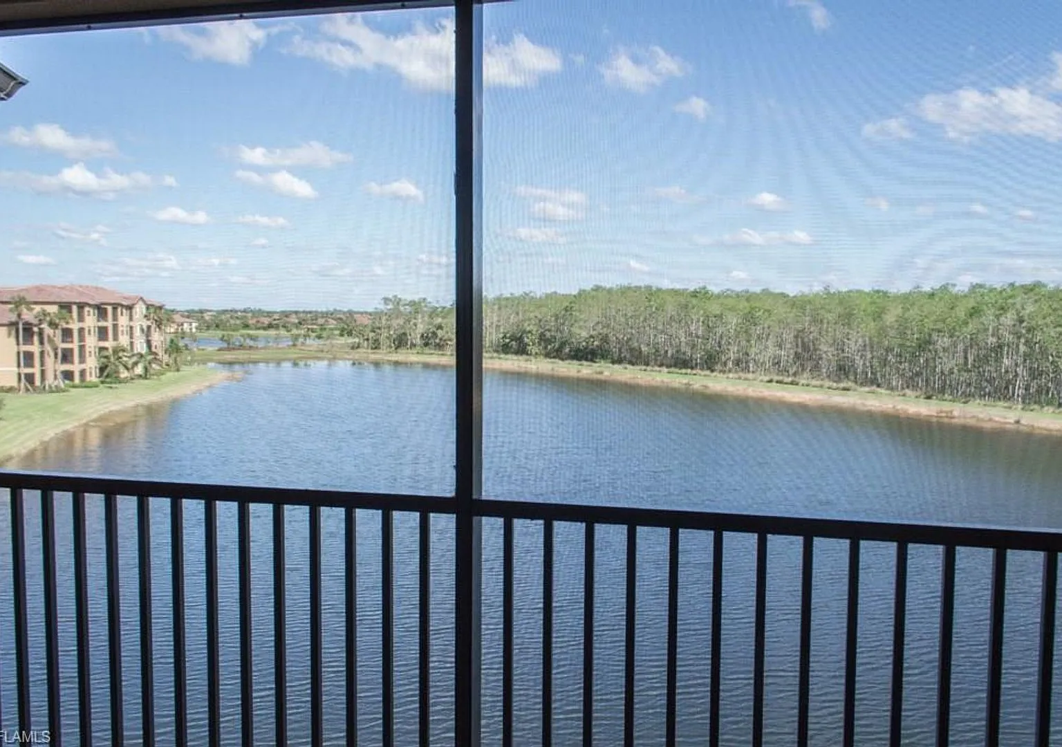 New Top Floor Condo in the Resort Style Community of Treviso Bay — Photo 2