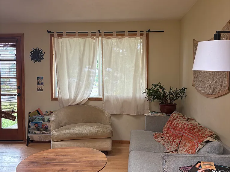 This is the living room with the front door and main entrance.