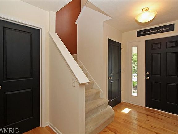 BEAUTIFUL HARDWOOD FOYER - ROOMY AND BRIGHT! W/GUEST BATH AND LARGE COAT CLOSET