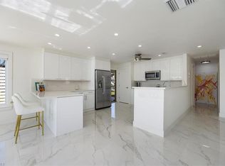 16 Knights Bridge Rd, Naples, FL 34112